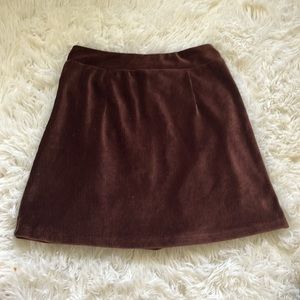 Brown and fits as 9-10.